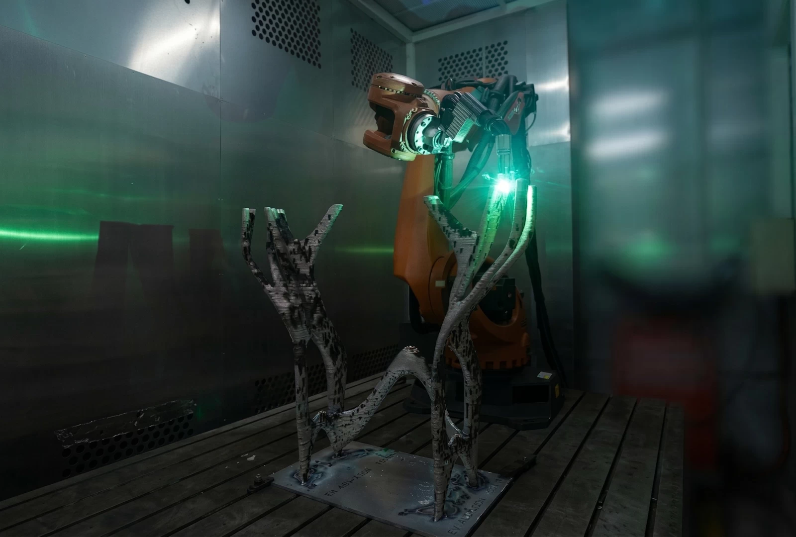 View inside a WAAM 3d printing booth of the aluminium chassis of the PIX Moving Beastie electric city vehicle being 3d printed