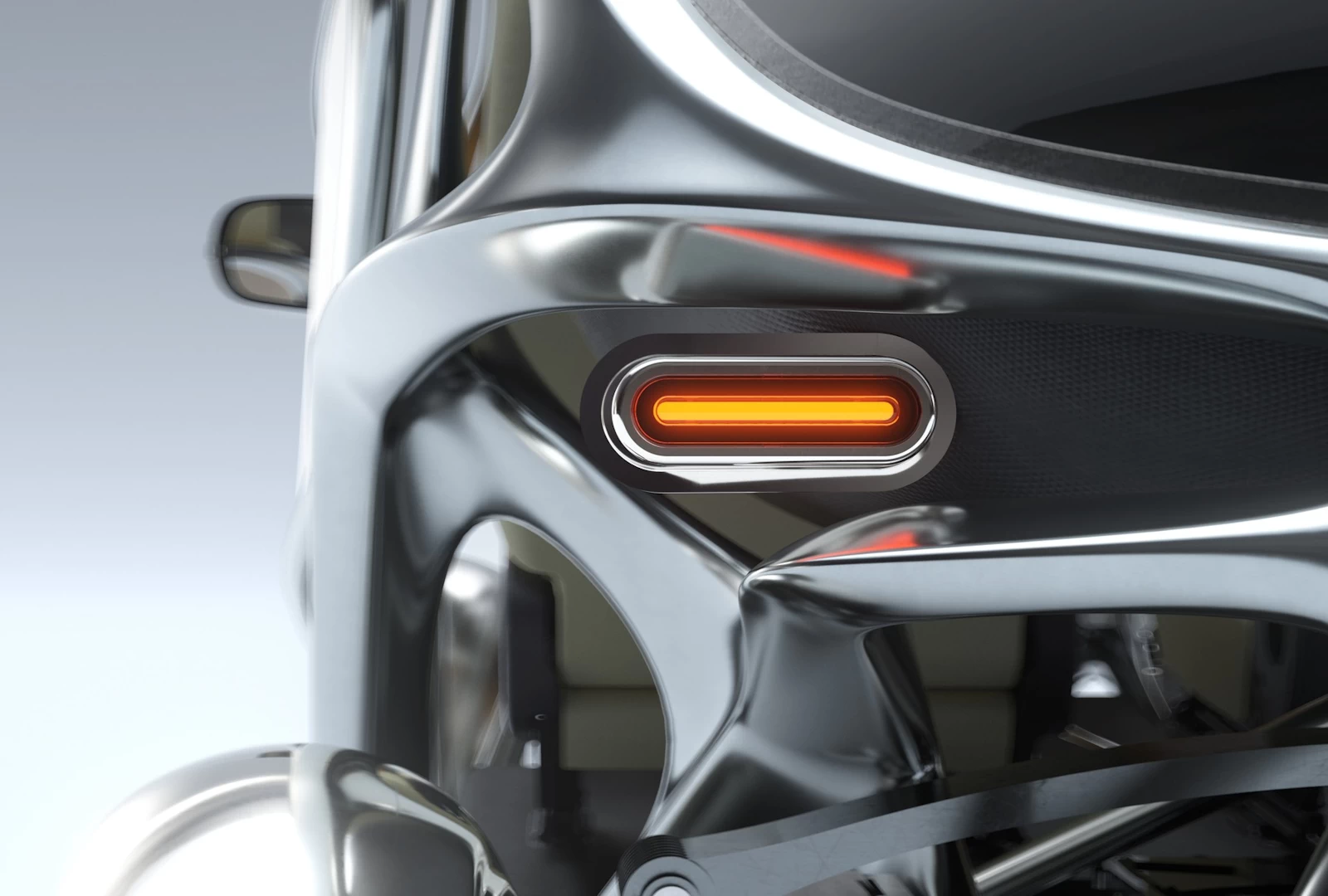 Rear closeup view of a taillight and surrounding body of the PIX Moving Beastie small open-air 2 seater city car 3d printed out of aluminium