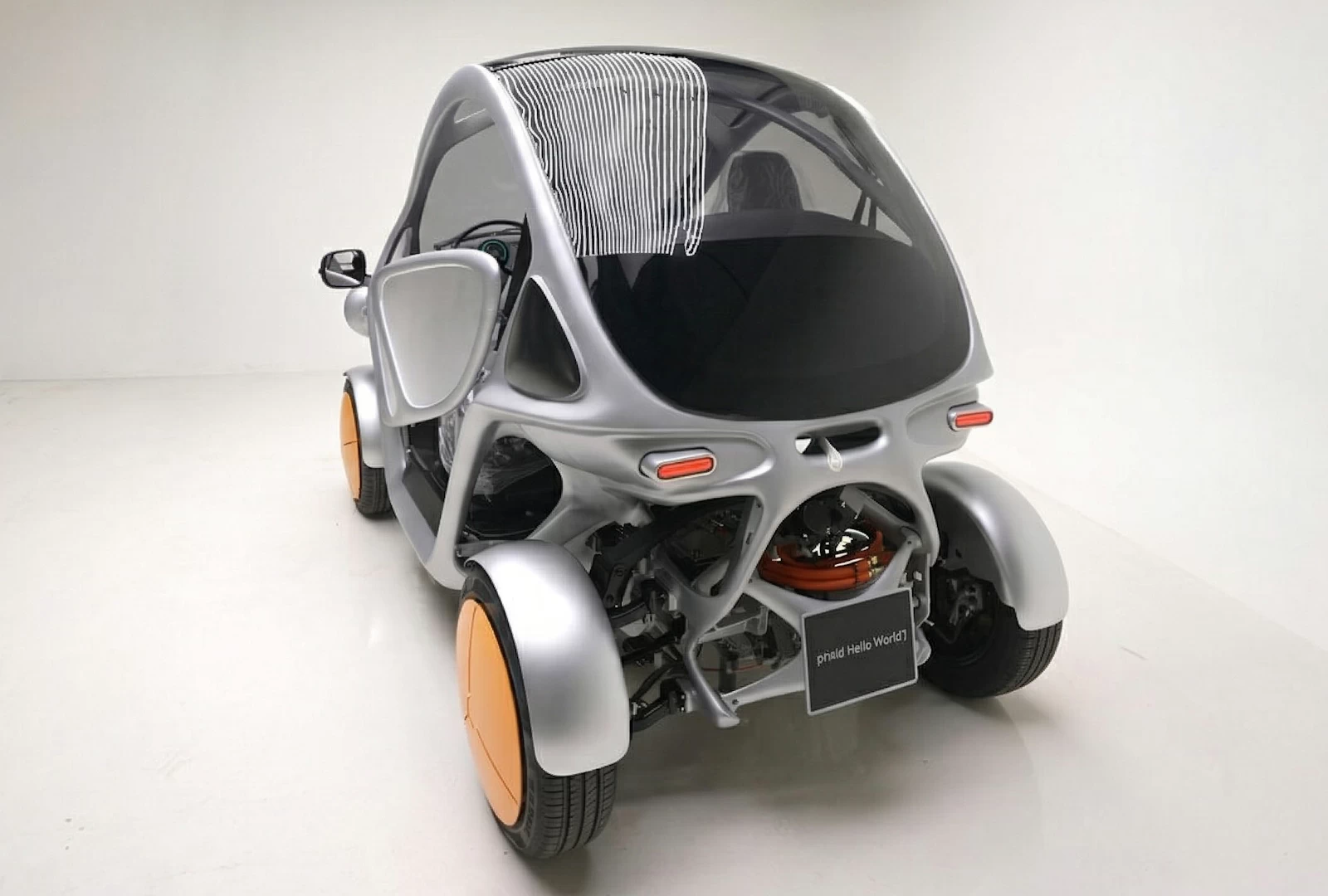 Rear view of the PIX Moving Beastie small open-air 2 seater city car 3d printed out of aluminium