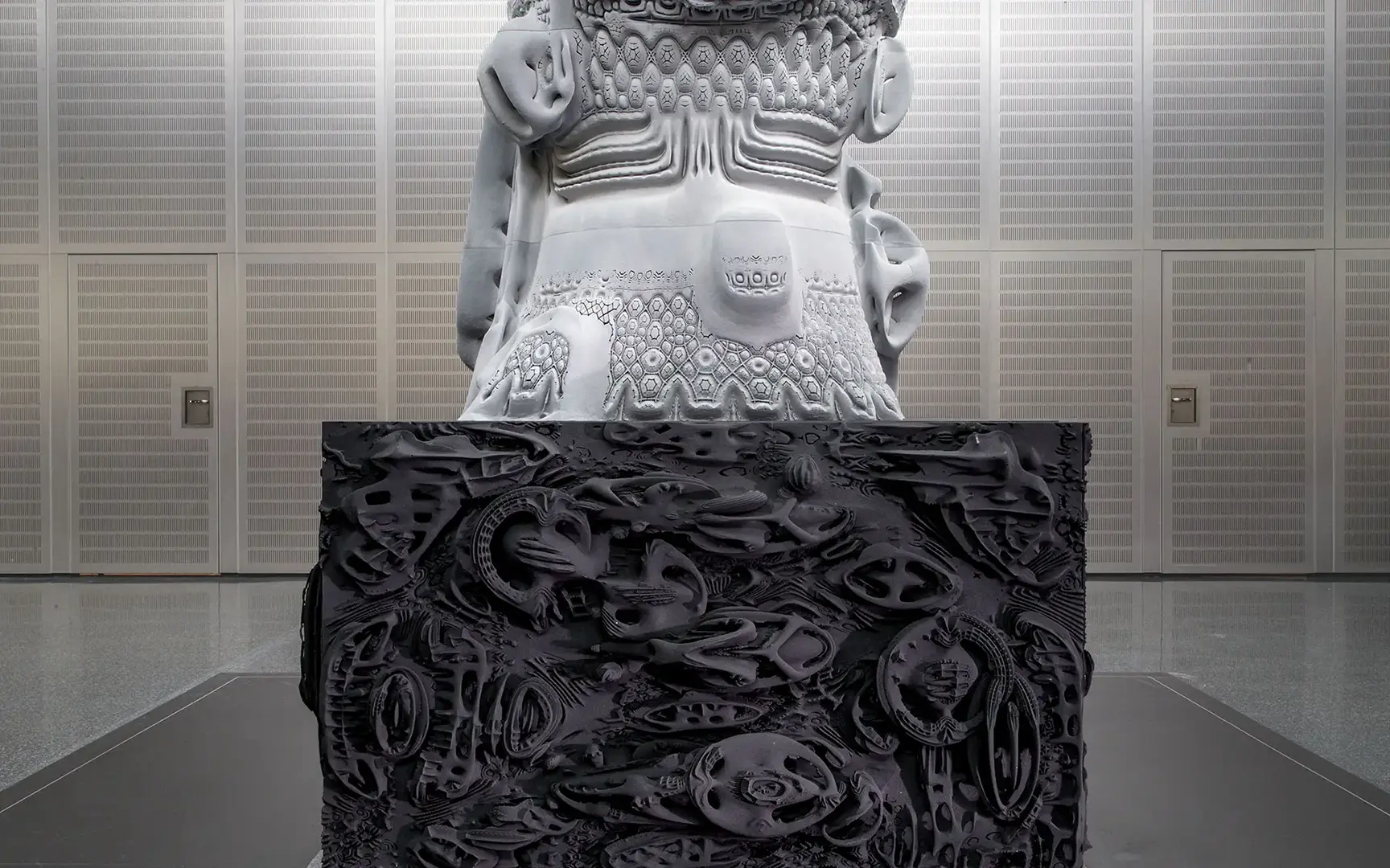 Front view of the black square base with complex patterned surface