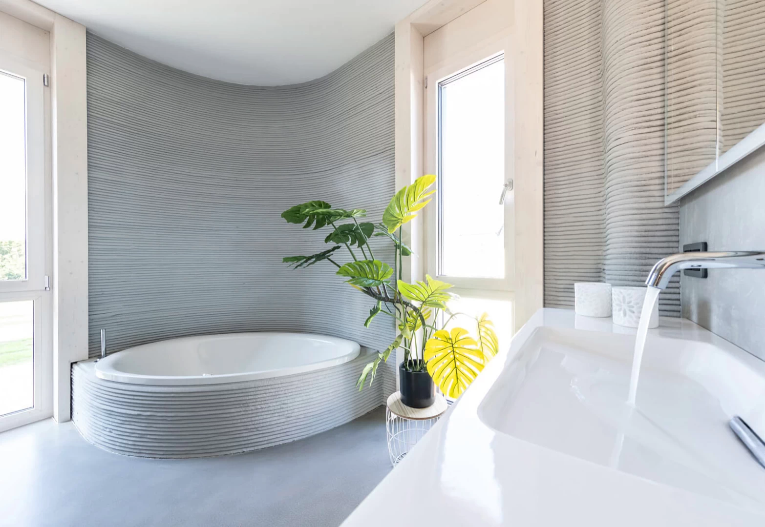 View of bathroom inside grey 3d printed concrete house