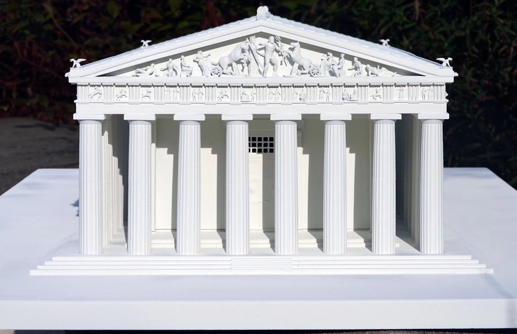 Front view of a white model of the parthenon in athens 3d printed in sla resin