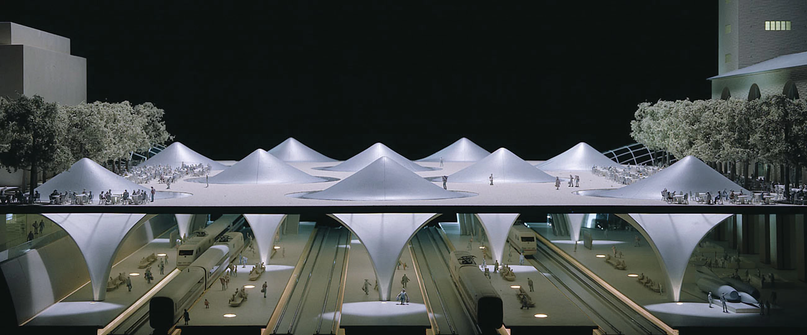 Front view of a 3d printed model of a futuristic train station with organically shaped skylight cones
