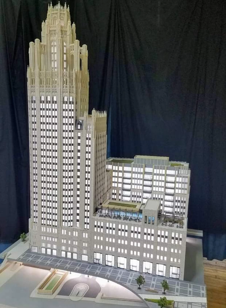 Side view of a white 3d printed model of gothic shaped building