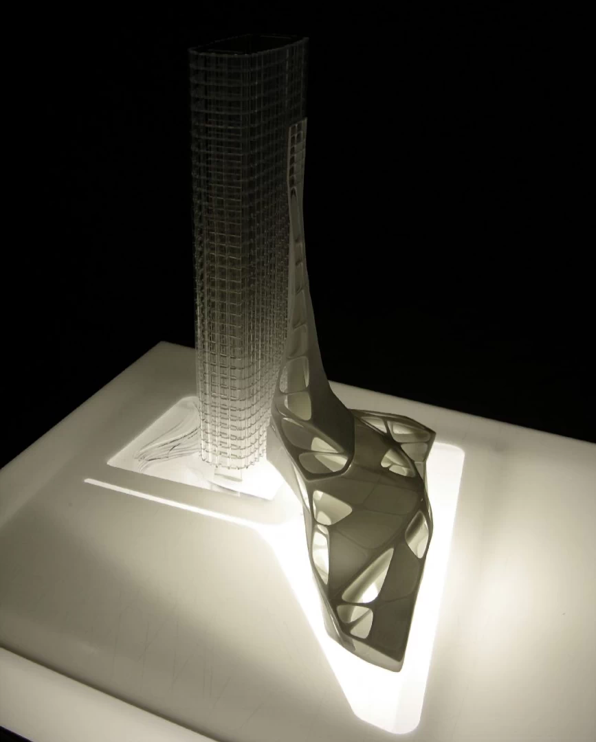 Side view of a white organically shaped model of lobby section of clear tower 3d printed in sintered nylon